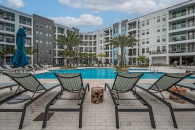 resort-style pool with lounge chairs